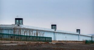 Guard towers stand on the perimeter wall of the Urumqi No. 3 Detention Center in Dabancheng in western China's Xinjiang Uyghur Autonomous Region.