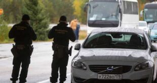 Finnish border agents guard the Russian border in Virolahti, Finland, on Sept. 30, 2022, amid an EU crackdown on visas for Russian citizens.