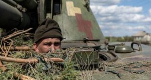 FILE PHOTO: An Ukrainian soldier looks out from a tank, amid Russia's invasion of Ukraine, in the frontline city of Lyman, Donetsk region, Ukraine, April 28, 2022. 