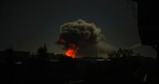 Smoke rises after big explosions in Kharkiv, Ukraine, early Saturday, Oct. 8, 2022.