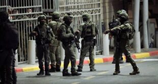 Israeli security forces patrol next to the scene of a shooting attack near the Shuafat refugee camp in Jerusalem, Saturday, Oct. 8, 2022.