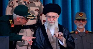 In this picture released by the official website of the office of the Iranian supreme leader, Supreme Leader Ayatollah Ali Khamenei, center, listens to chief of the General Staff of the Armed Forces Gen. Mohammad Hossein Bagheri at a graduation ceremony for a group of armed forces cadets at the police academy in Tehran, Iran, Monday, Oct. 3, 2022. Khamenei responded publicly on Monday to the biggest protests in Iran in years, breaking weeks of silence to condemn what he called "rioting" and accuse the U.S. and Israel of planning the protests. 