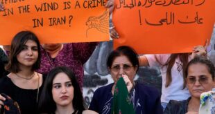 Kurdish women activists hold up placards during a protest against the death of Iranian Mahsa Amini in Iran, at Martyrs' Square in downtown Beirut, Lebanon, Wednesday, Sept. 21, 2022. 