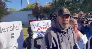 Protester allegedly attacks Herschel Walker with racial slur, crash press conference on Warnock evictions