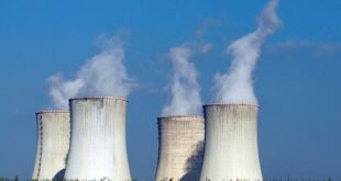 Four of the cooling towers of the Dukovany nuclear power plant rise high above the natural surroundings of Dukovany, Czech Republic. Austria is taking the European Union to court over a move that would classify natural gas and nuclear power and sustainable energies. 