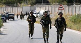 Israeli soldiers work near site where an Israeli soldier was killed by Palestinian militant gunfire near the West Bank Jewish settlement of Shavei Shomron, on Oct. 11, 2022.