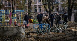 Emergency service personnel attend to the site of a blast next to a childrens playground in a park on October 10, 2022 in Kyiv, Ukraine. This morning's explosions, which came shortly after 8:00 local time, were the largest such attacks in the capital in months. (Photo by Ed Ram/Getty Images)